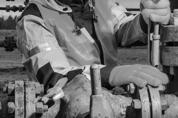 engineer working on an oil and gas pipeline